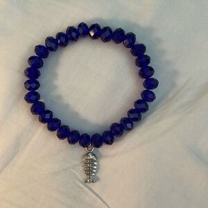 Sparkling blue glass beads stretch bracelet w sterling fish charm
